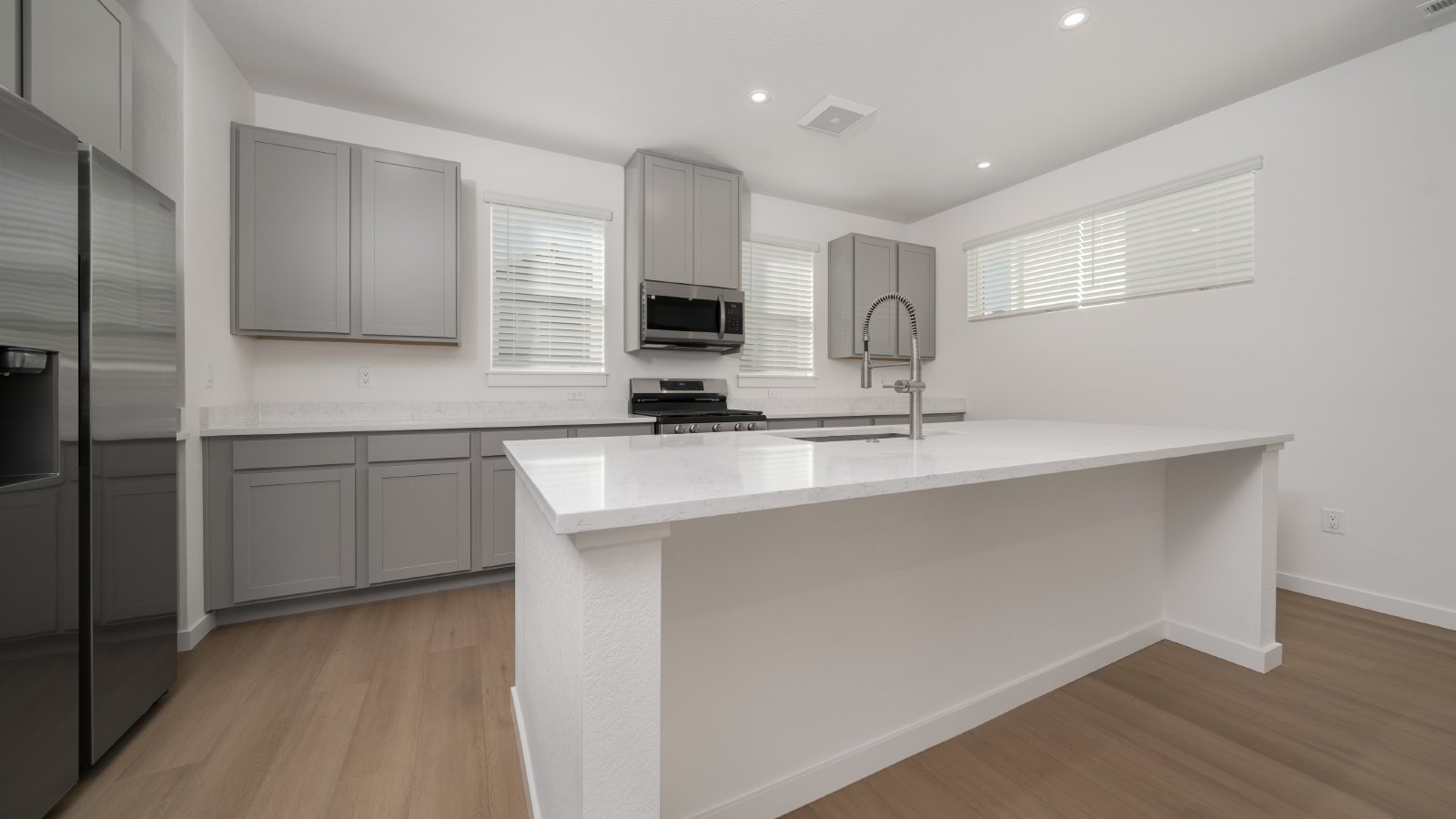 New townhome off of Interquest with a 2 car garage property image